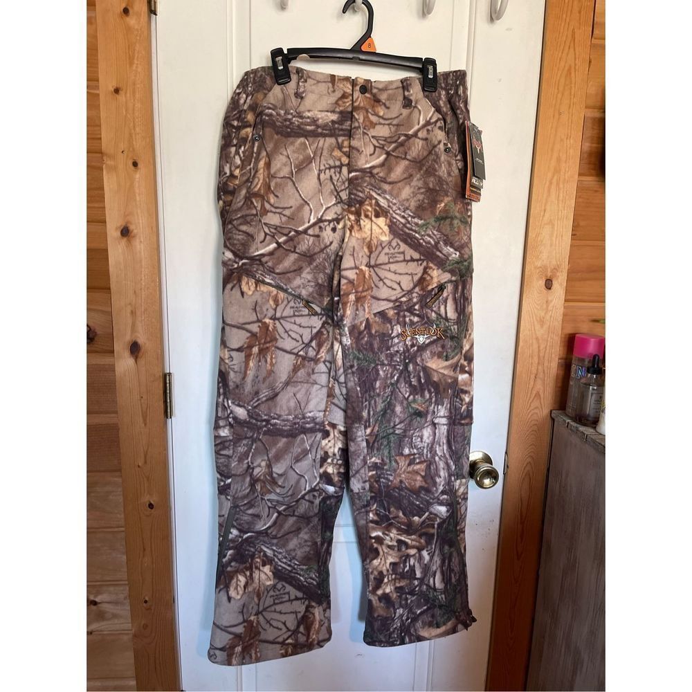 NWT Scent-Lok Mens camo fleece pants L. Zip 1/4 pant leg, snap and zip pockets..